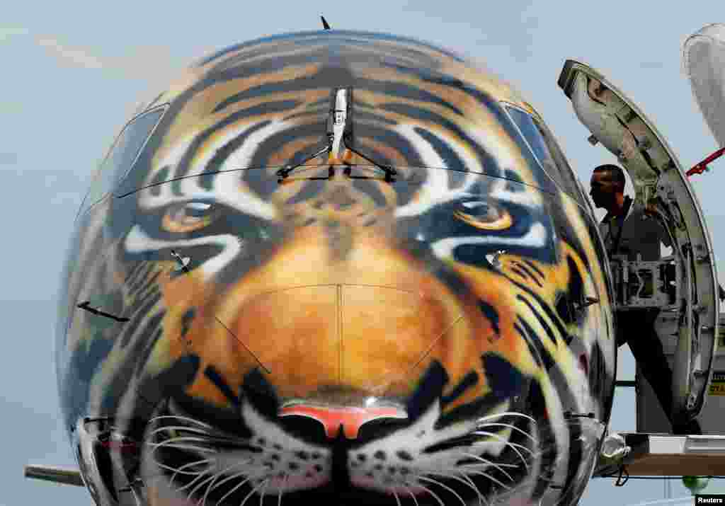 An Embraer E-190 E2 aircraft is displayed during a media preview of the Singapore Airshow.