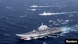 中国辽宁号航空母舰与随行船队在南中国海演习（2016年12月）