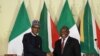 Nigeria's President Muhammadu Buhari shakes hands with his South African counterpart Cyril Ramaphosa during a news conference after a meeting, in Pretoria, South Africa, Oct. 3, 2019.