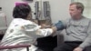 FILE - A new study published in the Journal of the American Medical Association finds that high blood pressure in people as young as 18 increases their risk for heart disease.