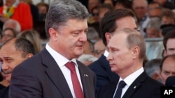 Президенти Петро Порошенко і Володимир Путін у Франції