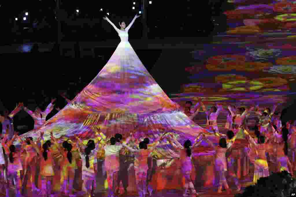 Performers dance at the closing ceremony of the 2018 Winter Paralympics in Pyeongchang, South Korea.