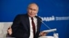 Presidenti rus Vladimir Putin gjatë një diskutimi në klubin Valdai, që po mbahet në Soçi, në Detin e Zi/AFP