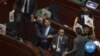 Hong Kong Chief Executive Walks Out of Legislature Amid Jeers