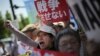 日本内阁通过新安保法相关法案