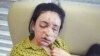 Lamiya Hachi Bashar laying on a couch while waiting for treatment, May 2, 2016. (Photo courtesy of Bashar’s uncle Idris Kojo) 