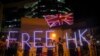 Demonstrators wave a British flag during a rally outside of the British Consulate in Hong Kong, Oct. 23, 2019. 