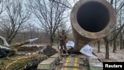 Український військовослужбовець у Бахмуті, 13 січня 2023. REUTERS/Vladyslav Smilianets