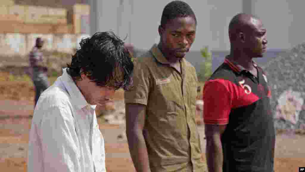 TOGO A trio of smugglers - one of them Vietnamese - were displayed after authorities in Lome discovered two shipping containers marked timber and cashew nuts contained 500 elephant tusks worth $8 million bound for Vietnam's black market. DNA tests revealed the tusks were poached from at least nine other African countries.