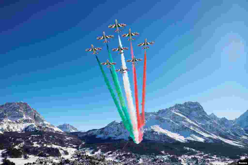 The aerobatic demonstration team of the Italian Air Force, The Frecce Tricolori ("Tricolor Arrows"), performs before the start of the Alpine World Ski Championships in Cortina d'Ampezzo, Italy.