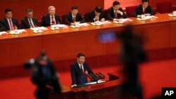 中共总书记习近平在北京人大会堂召开的中共19大开幕式上发表讲话。 （2017年10月18日）