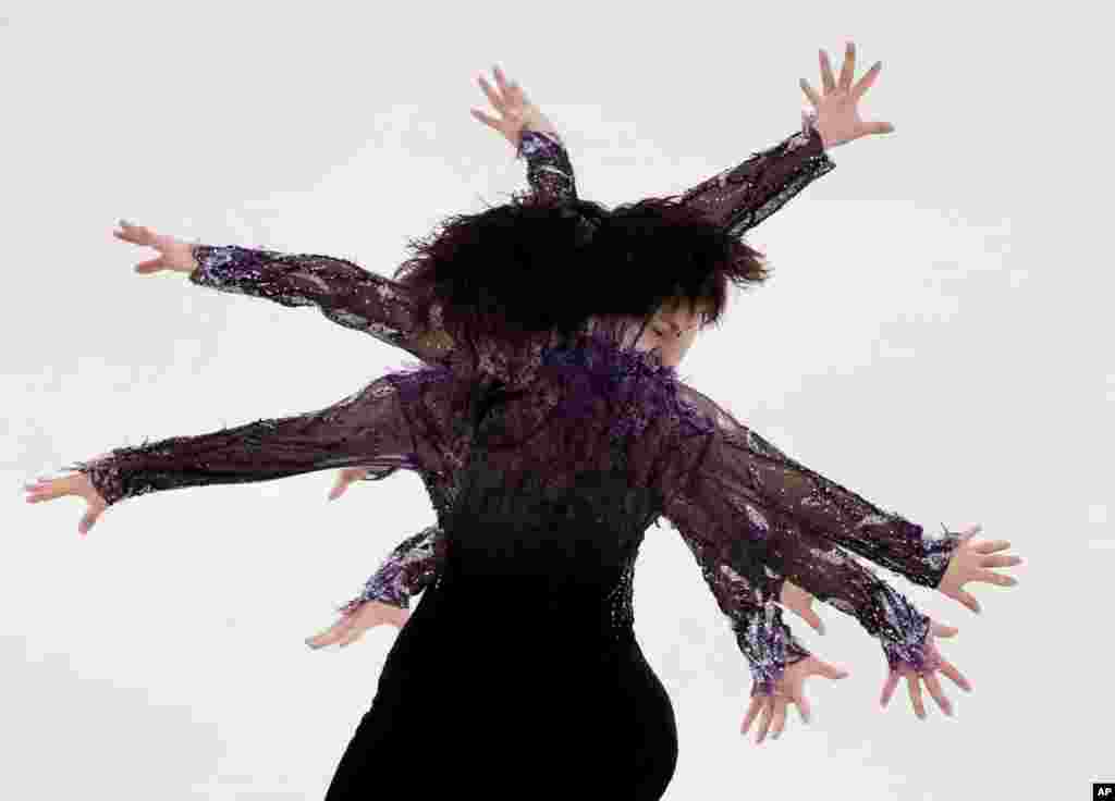 In this multiple exposed image Japan's Shoma Uno performs in the men's single short program team event at the 2018 Winter Olympics in Gangneung, South Korea, Friday, Feb. 9, 2018.
