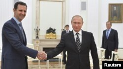 Башар Асад і Володимир Путін у Москві