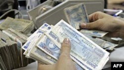 Việt Nam không có kế hoạch giảm giá tiền đồng