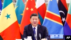 资料照片：中国领导人习近平2021年11月在中非合作论坛的一场会议开幕式上致辞。