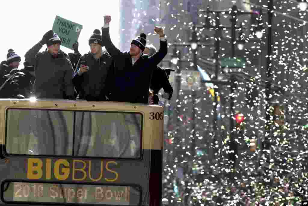 Philadelphia Eagles NFL football team quarterbacks Nick Foles, left, Nate Sudfeld, center and Carson Wentz ride in the Eagles team parade and celebration in Philadelphia, Pennsylvania.