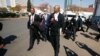 Lawyers representing opposition Movement for Democratic Change (MDC) leader Nelson Chamisa arrive at court to challenge President Emmerson Mnangagwa's election victory, in Harare, Zimbabwe, Aug. 22, 2018. 