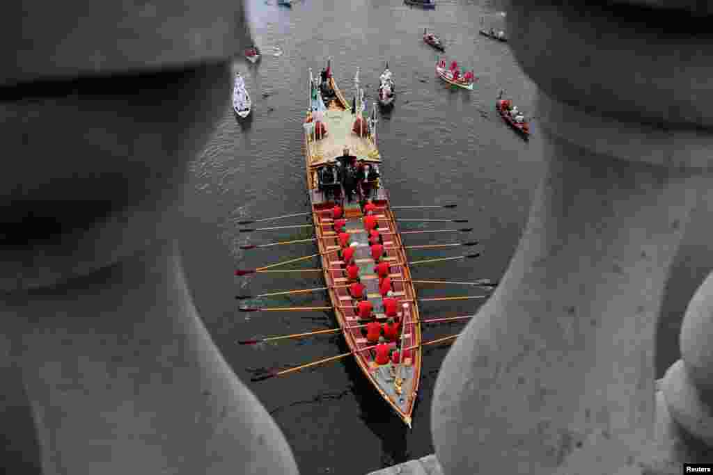 The royal rowbarge Gloriana, is seen before the annual men's and women's boat races between Oxford University and Cambridge University, on the river Thames in London, March 24, 2018.