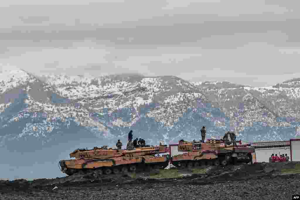 Turkish tanks are parked near the Syrian border at Hassa, in Hatay province, as part of the operation "Olive Branch", launched a few days ago. The operation aims to oust the People's Protection Units (YPG) militia, which Turkey considers to be a terror group, from its enclave of Afrin.