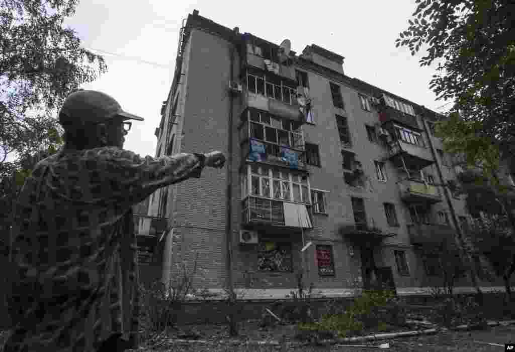 Будинок ушкоджений артилерійським обстрілом. Слов'янськ.