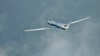 这张美国海军2014年9月18日拍摄的照片显示，MQ-4C“人鱼海神”无人驾驶侦察机在马里兰州帕图克森海军航空站完成首次跨越全国转场飞行。