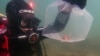 FILE - This handout photo taken on Jan. 11, 2024, and released on Jan. 31 by the University of Tasmania's Institute for Marine and Antarctic Studies shows a critically endangered red handfish being taken as part of a safeguard measure from waters off Australia's Tasmania state.