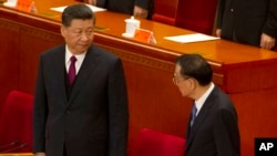 资料照片：中国最高领导人习近平和中国总理李克强出席2019年4月30日举行的纪念五四运动100周年大会。