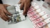 世界媒体看中国：美中金融博弈
