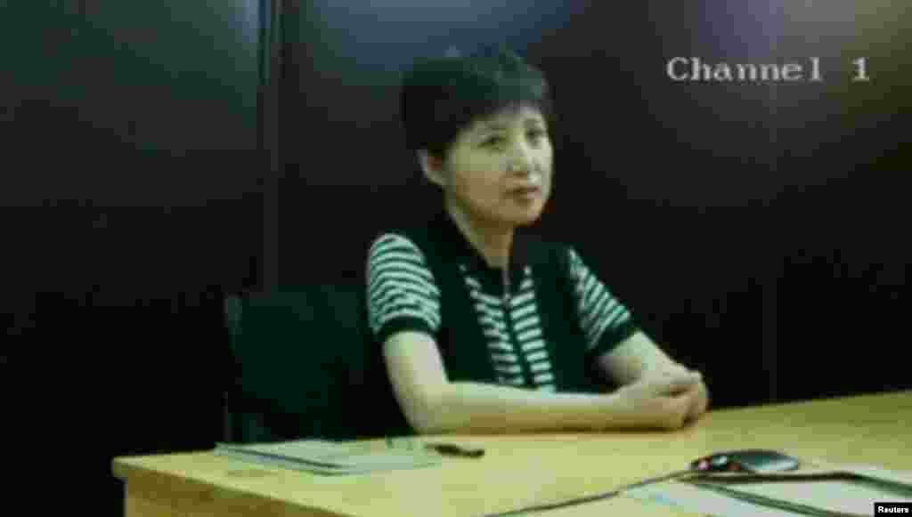 谷开来,2013年8月10日济南中级人民法院视频截屏。2013年8月23日济南中级人民法院在薄熙来审判庭上展示该截屏。