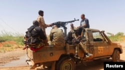 Wanajeshi wa jeshi la Sudan wakipiga doria mjini Omdurman