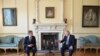 Britain's Prime Minister Boris Johnson, right, and U.S. Secretary of State Antony Blinken meet inside 10 Downing Street in London, May 4, 2021.
