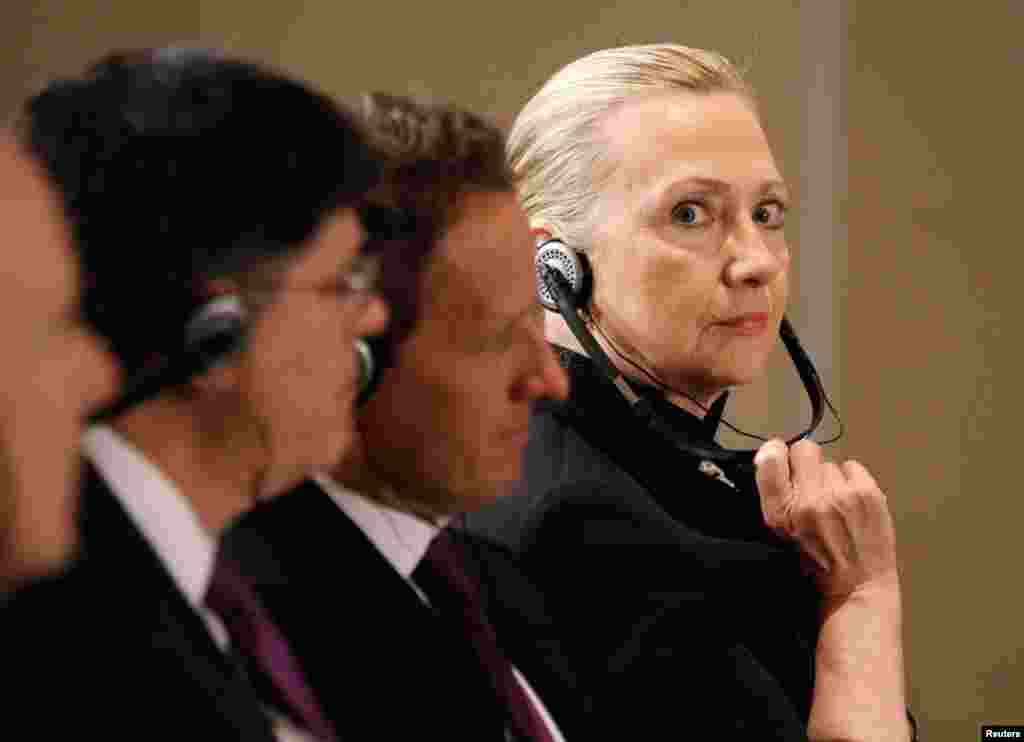 Clinton is pictured in the U.S. delegation as President Barack Obama meets with Mexico's President Felipe Calderon in Los Cabos June 18, 2012, to attend the G20 leaders summit.
