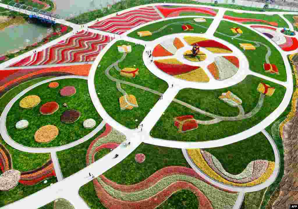 An aerial view of a park decorated with different colored flowers in Nantong in China's Jiangsu province, March 28, 2018.