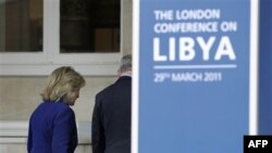 Державний секретар США Гілларі Клінтон прибуває на конференцію у справі Лівії.