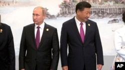 俄罗斯总统普京和中国国家主席习近平2017年9月4日在金砖峰会上合影