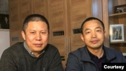 资料照片：中国维权律师许志永（左）和丁家喜。