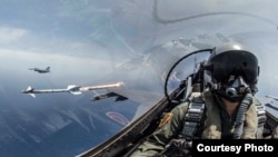 资料照：2019年5月22日台湾海空联合操演，F-16战机发射响尾蛇导弹射击模拟目标。