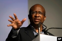 Sy Mamabolo, Chief Electoral Officer of the Independent Electoral Commission (IEC), speaks at the podium at the results center in Pretoria, South Africa, May 9, 2019.
