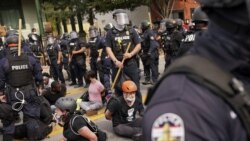 olice detain protesters, Wednesday, Sept. 23, 2020, in Louisville, Ky. A grand jury has indicted one officer on criminal charges six months after Breonna Taylor was fatally shot by police in Kentucky.