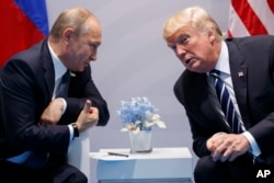 Володимир Путін і Дональд Трамп за лаштунками саміту G20