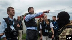 Гуґ на місці падіння літака рейсу MH17 на Донбасі 18/07/2014