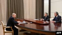 Зустріч очільника МАГАТЕ Гроссі з президентом РФ Путіним та очільником "Росатома" Ліхачовим. Фото: Ramil Sitdikov/AFP