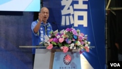 国民党台湾总统候选人、高雄市长韩国瑜在新北市板桥体育馆举行的国民党全代会上接受总统候选人提名后发表讲话。（2019年7月28日，美国之音林枫拍摄）