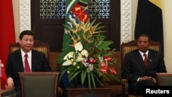 中国国家主席习近平同坦桑尼尼亚总统贾卡亚·基奎特2013年3月24日就双边问题在达累斯萨拉姆桑尼尼亚总统官邸举行正式会谈