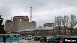 Архівне фото: Запорізька АЕС, кортеж із місією експертів Міжнародного агентства з атомної енергії (МАГАТЕ) у супроводі російських військових, 29 березня 2023 р. REUTERS/Alexander Ermochenko