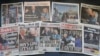A selection of the front pages of British national newspapers on sale in London, Jan. 21, 2021, showing the headlines following the inauguration of President Joe Biden.