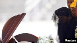 Former first lady of Zimbabwe, Grace Mugabe pays her last respects during a state funeral of her husband and the country's longtime ruler Robert Mugabe, at the national sports stadium in Harare, Sept. 14, 2019. 