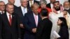 2019年6月28日在日本大阪举行的20国集团峰会上特朗普总统与中国国家主席习近平握手