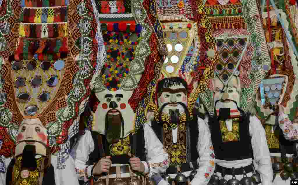 Dancers, known as "Kukeri", perform during the International Festival of the Masquerade Games in Pernik, near Sofia, Bulgaria.