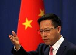 资料照片: 中国外交部发言人赵立坚在北京举行的记者会上回答问题。(2020年4月8日)